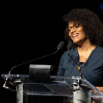 Portia Clark stands at a stadium
