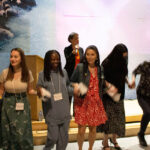people participating in a round dance