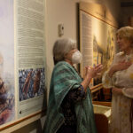 Two women talk in the Millbrook Cultural Centre