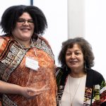 Two women smiling