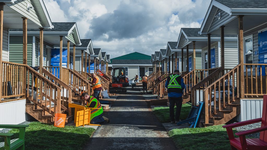 A walkway in between two rows of United Way's tiny homes affordable housing project