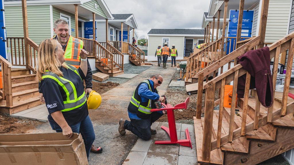 Volunteers from Shaw and IKEA helped to assemble furniture and set up tiny homes ahead of welcoming residents to the Sackville Tiny Home Community. 